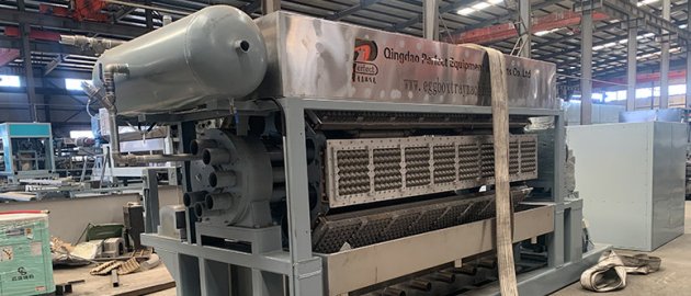 How does an egg tray machine work and how can disposable egg box trays be produced from waste paper old carton boxes?